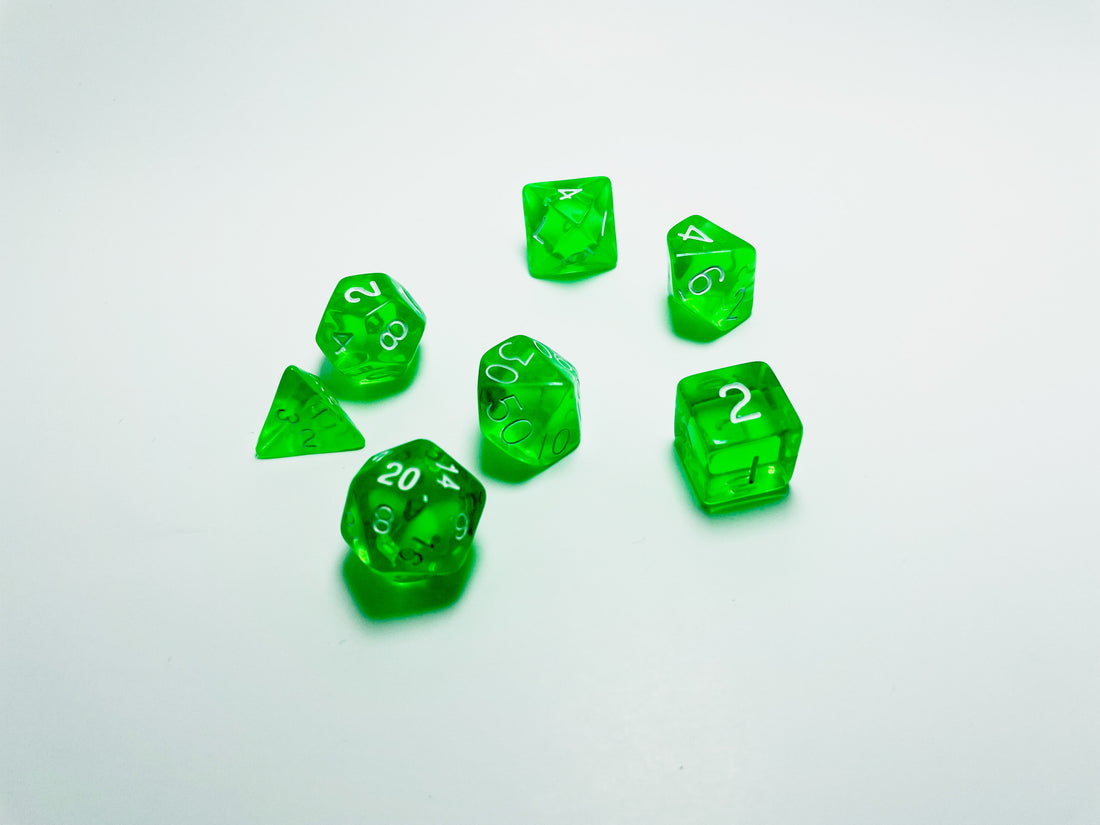 6 green dice for playing a tabletop roleplaying game on a white background